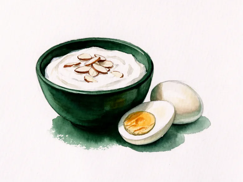 Akvarel af skyr-skål, æg og mandler